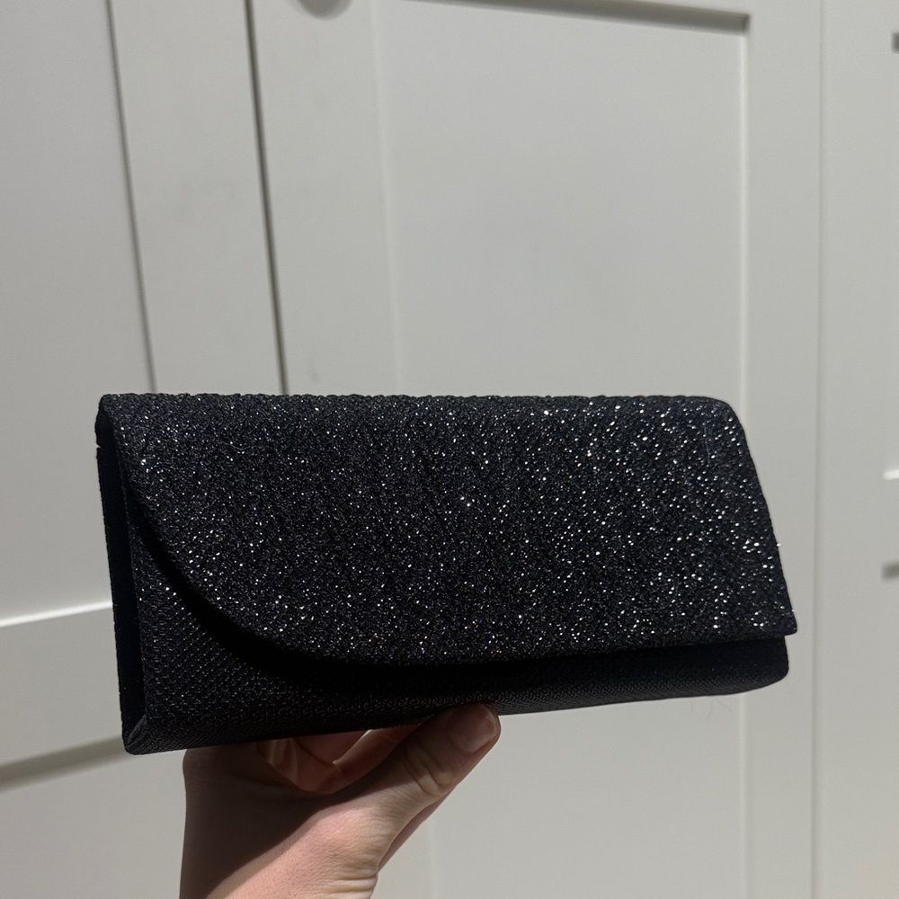 Asymmetrical sparkly clutch